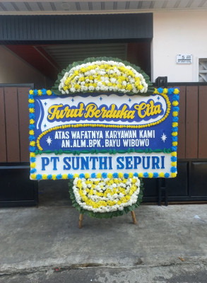 Papan Bunga Duka di Tampu Langit