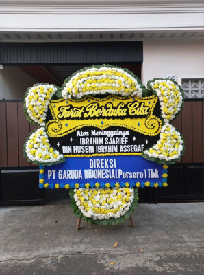 Papan Bunga Duka di Tampu Langit