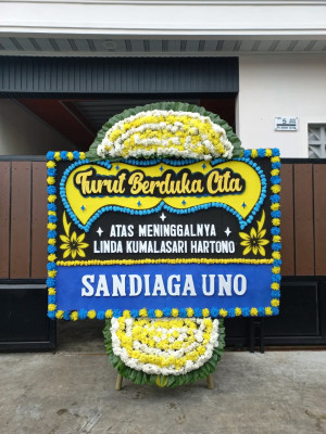 Papan Bunga Duka di Tampu Langit